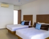 2 BR Lunada Condo — L-304 - Interior - Bedroom 2 - 2 Double Beds + Balcony