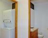 2 BR Studio One Condo — S1-202 - Interior - Half Bath + Laundry Room
