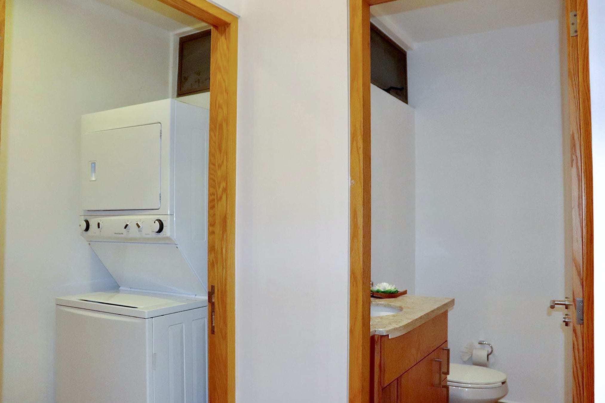 2 BR Studio One Condo — S1-202 - Interior - Half Bath + Laundry Room