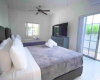 3 BR Mimi Villa - Bedroom 2 - 2 Queen Beds + Patio